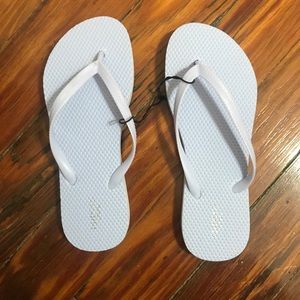 Light blue flip flops